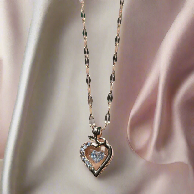 Dangling Rose Gold Heart Cage Pendant (KCJ0021)