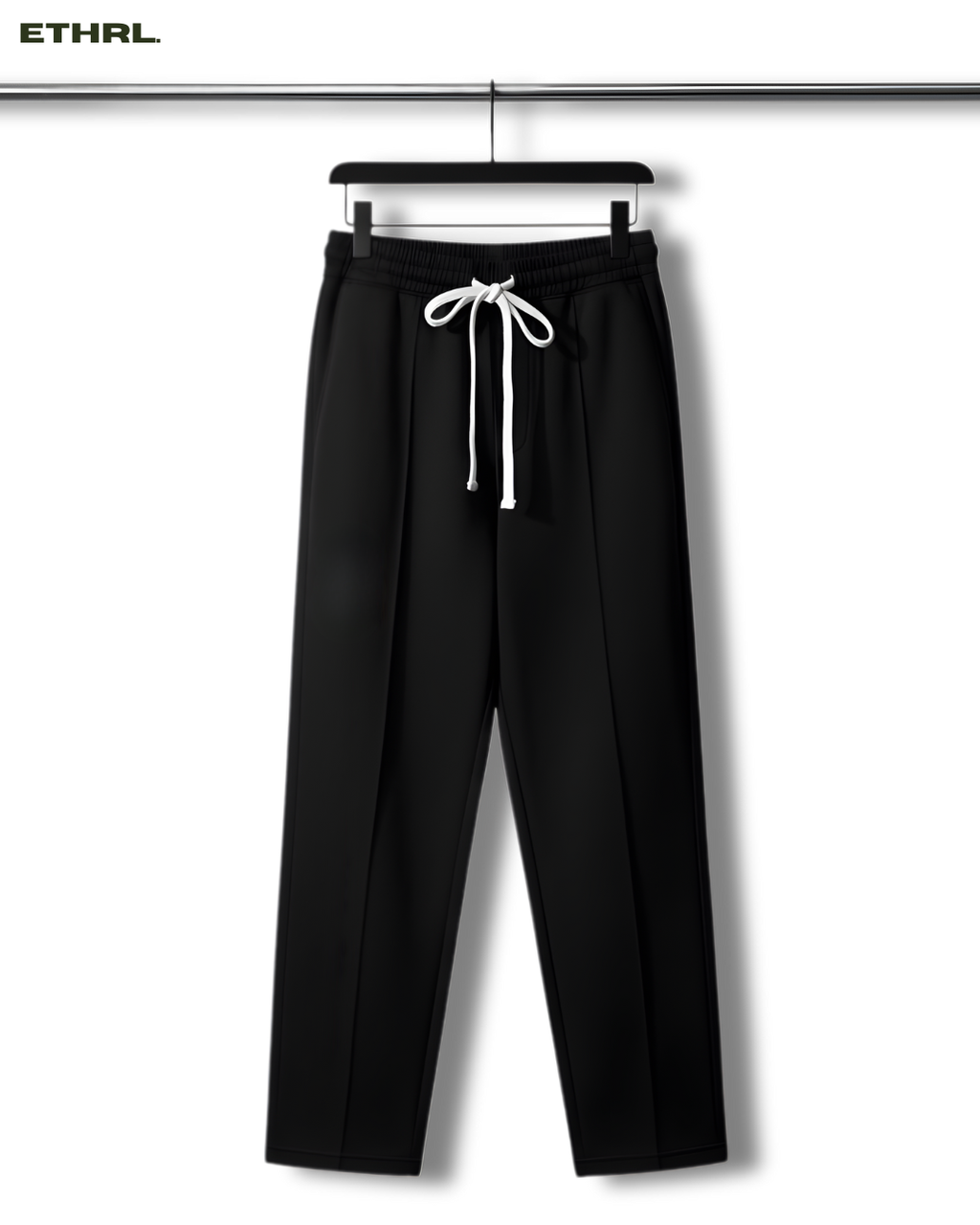 Black pants with a white drawstring on a hanger against a white background, featuring the brand 'ETHRL'.